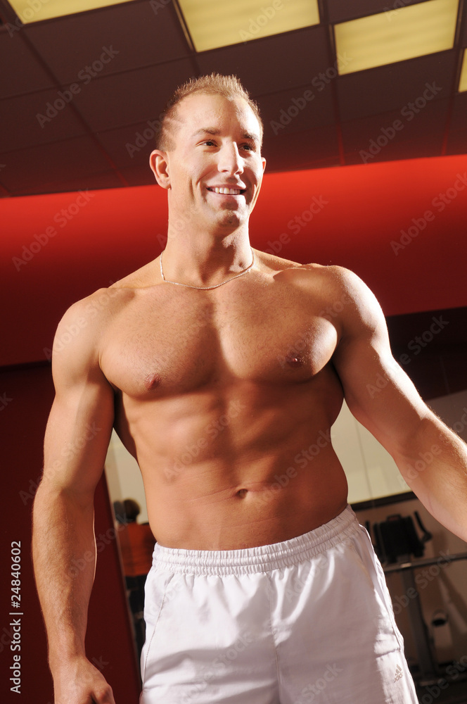 Fototapeta premium The man in fitness centre