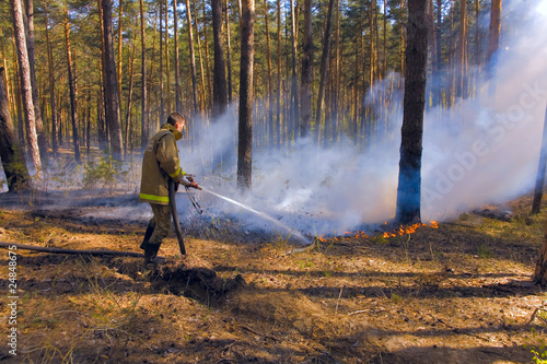 Fireman in forest fire in Russia