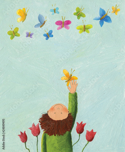 Boy and colorful butterflies photo