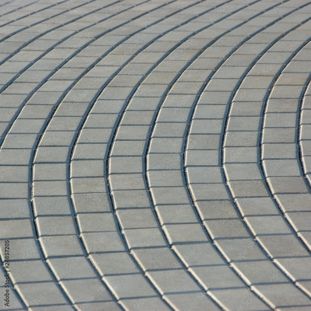 Obraz premium Grey Cobblestone Pavement Texture, Radial Pattern Perspective, Detailed Closeup