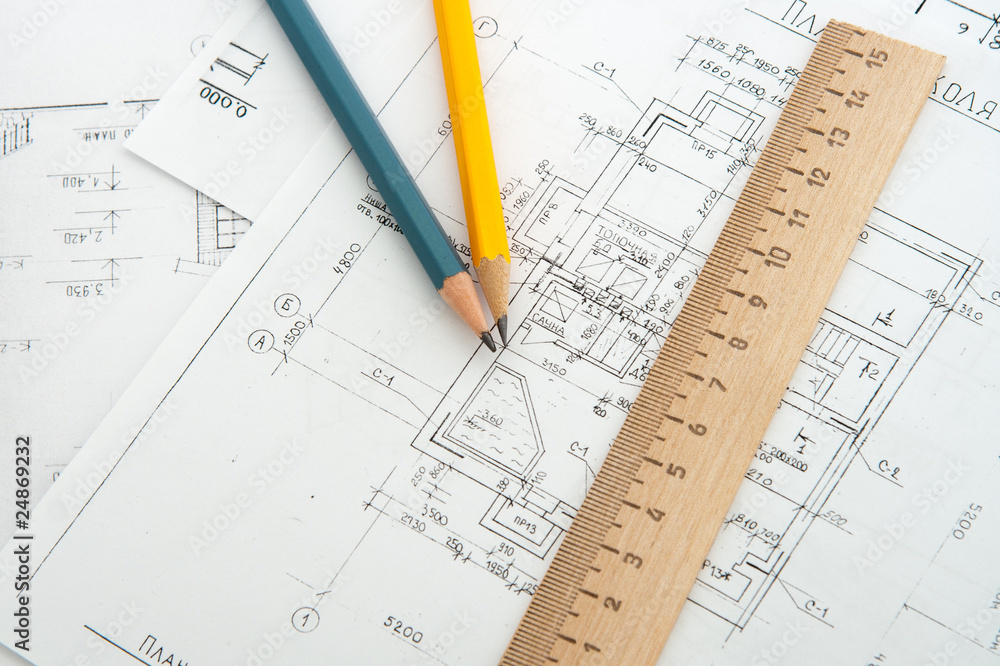 Architectural plans and blueprints in office Architectural plans and blueprints in office