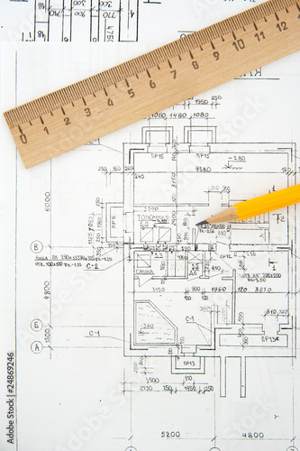 Architectural plans and blueprints in office