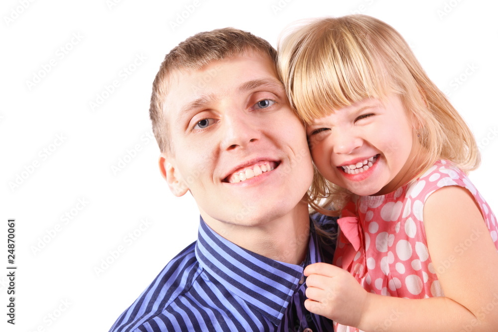 little girl is cuddle father. girl and father is smiling.