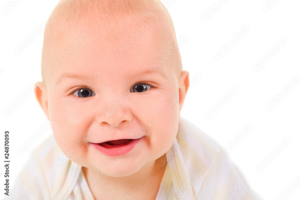 portrait of baby.  baby looking and smiling. isolated.