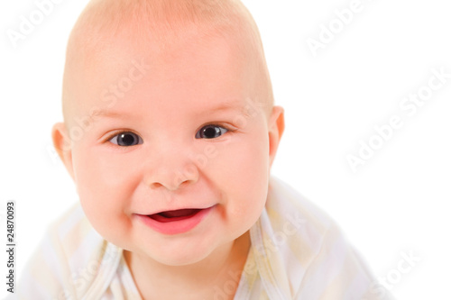 portrait of baby.  baby looking and smiling. isolated.