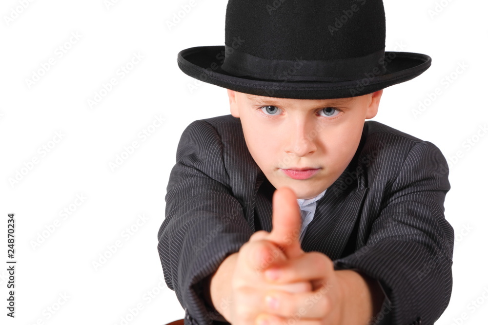 little boy wearing suit and hat is playing gangster. isolated. little boy wearing suit and hat is playing gangster. isolated.