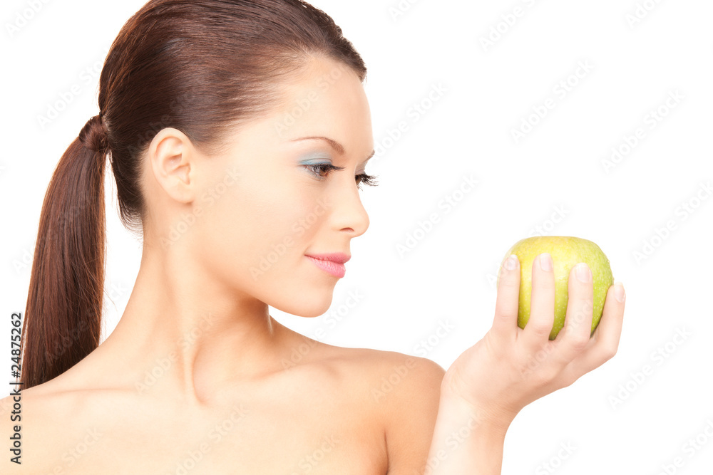 young beautiful woman with green apple young beautiful woman with green apple