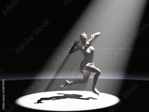 Skater under spotlight photo