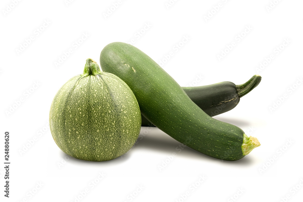 fresh green zucchinis isolated on white background fresh green zucchinis isolated on white background