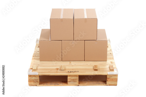 cardboard boxes on wooden palette