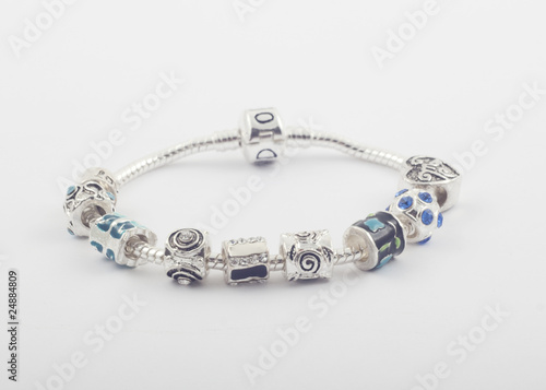 Silver bracelet with beads on white