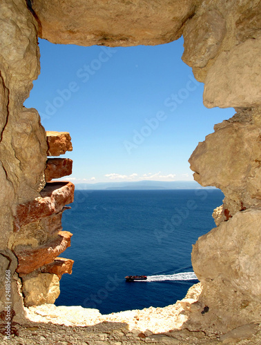 A window on the sea from Fortress of San Nicola Island (Tremiti) photo