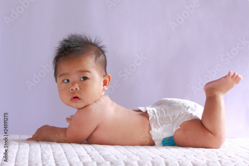 cute asia baby looking at you