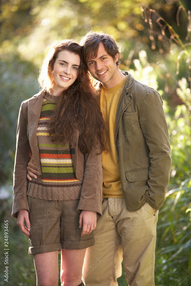 Fototapeta premium Portrait Of Romantic Young Couple In Autumn Landscape