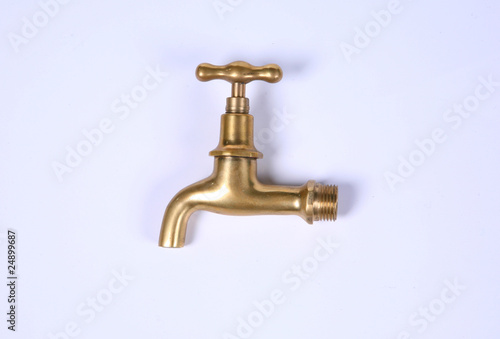 gold modern stainless steel tap. Isolated on white background.