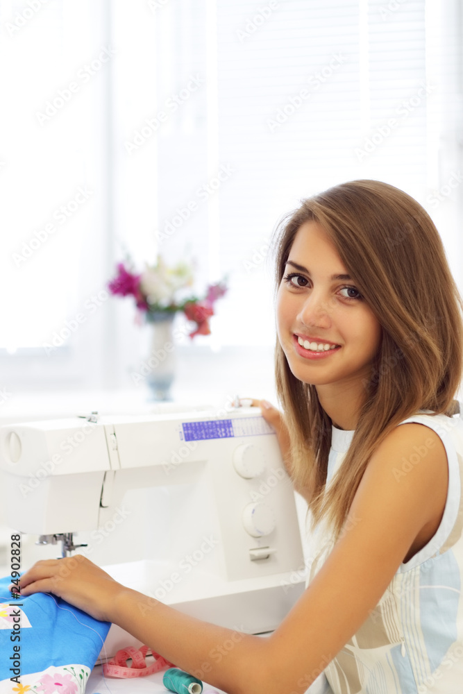 Girl and a sewing machine Girl and a sewing machine