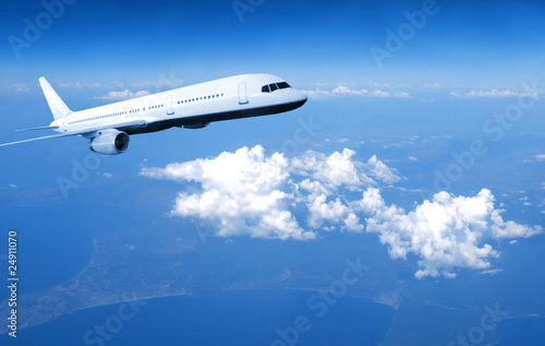 Airplane above clouds