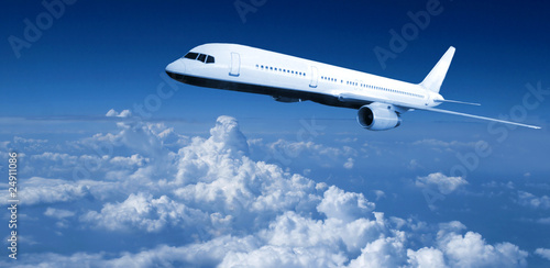 Airplane above clouds