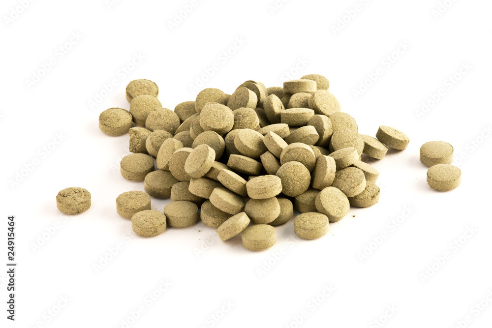 Herb Medicine Pellets isolated on white Herb Medicine Pellets isolated on white