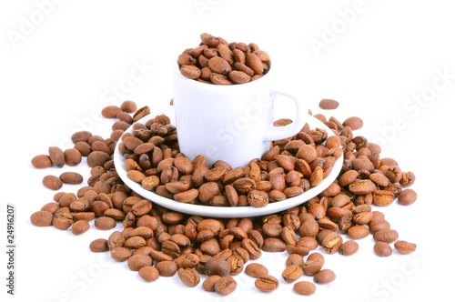 coffee cup filled with coffee beans