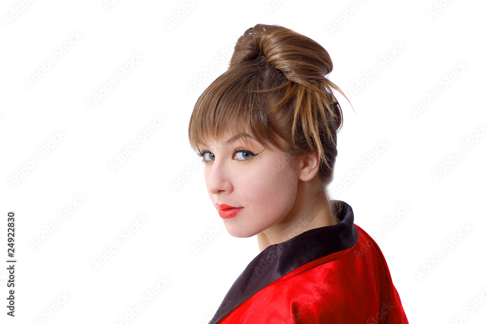 Portrait of a beautiful smiling girl in kimono looking brom the Portrait of a beautiful smiling girl in kimono looking brom the
