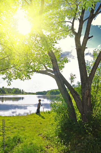 Boy fishing on the lake