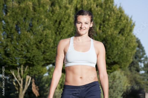 Young and Attractive Female Athlete Smiles.