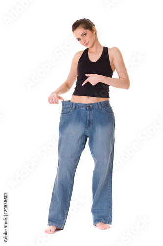 attractive female shows how her old huge jeans, wieght loss conc