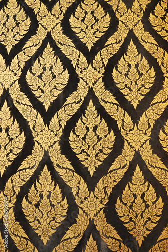 thai art gold painting pattern on door © suthiwat