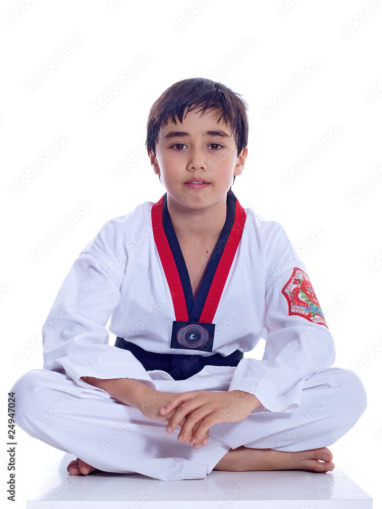 child practicing martial arts isolated on white background child practicing martial arts isolated on white background