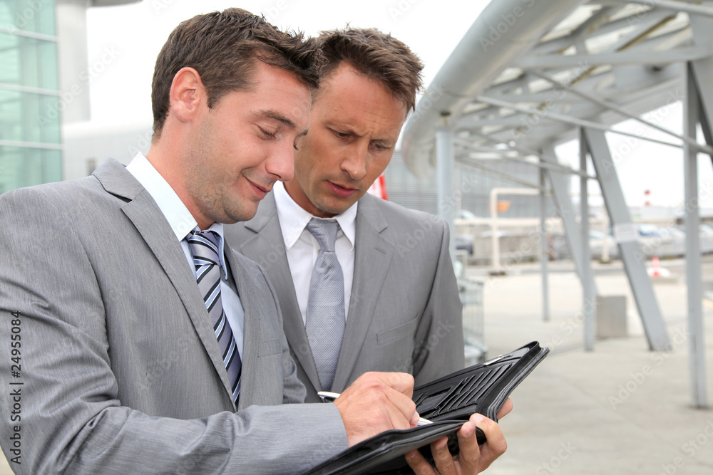 Businessmen in a business meeting away from the office Businessmen in a business meeting away from the office