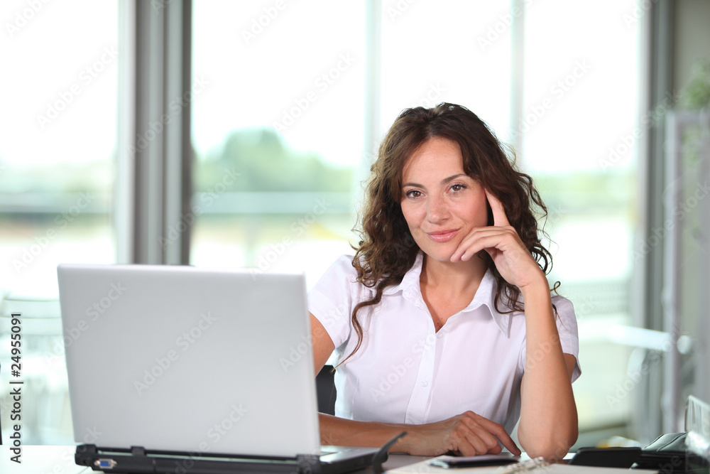 Businesswoman working in the office Businesswoman working in the office