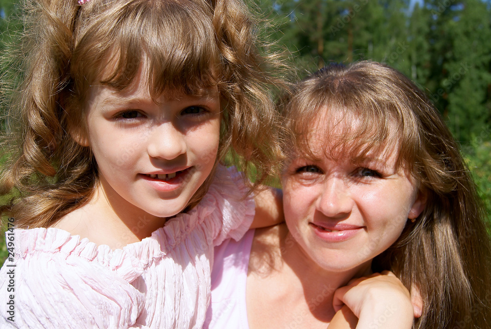 Beautiful mother and the daughter Beautiful mother and the daughter