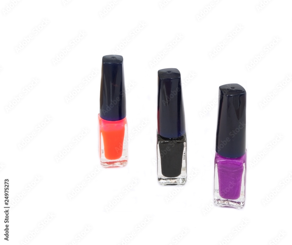 Bottle of Red, Black, Purple Nail Polish isolated on white backg Bottle of Red, Black, Purple Nail Polish isolated on white backg