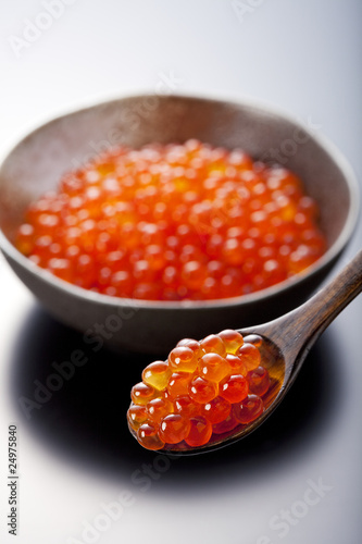 red caviar on the spoon