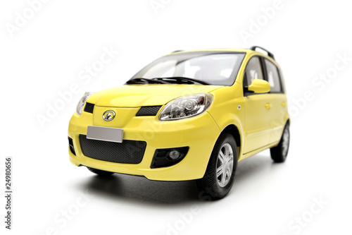 Generic modern yellow family car model on a white background