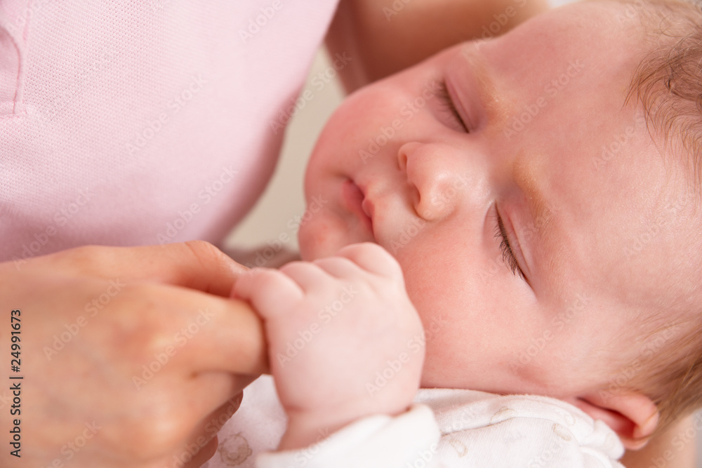 Close Up Of Baby Boy Holding Mothers Hand Close Up Of Baby Boy Holding Mothers Hand