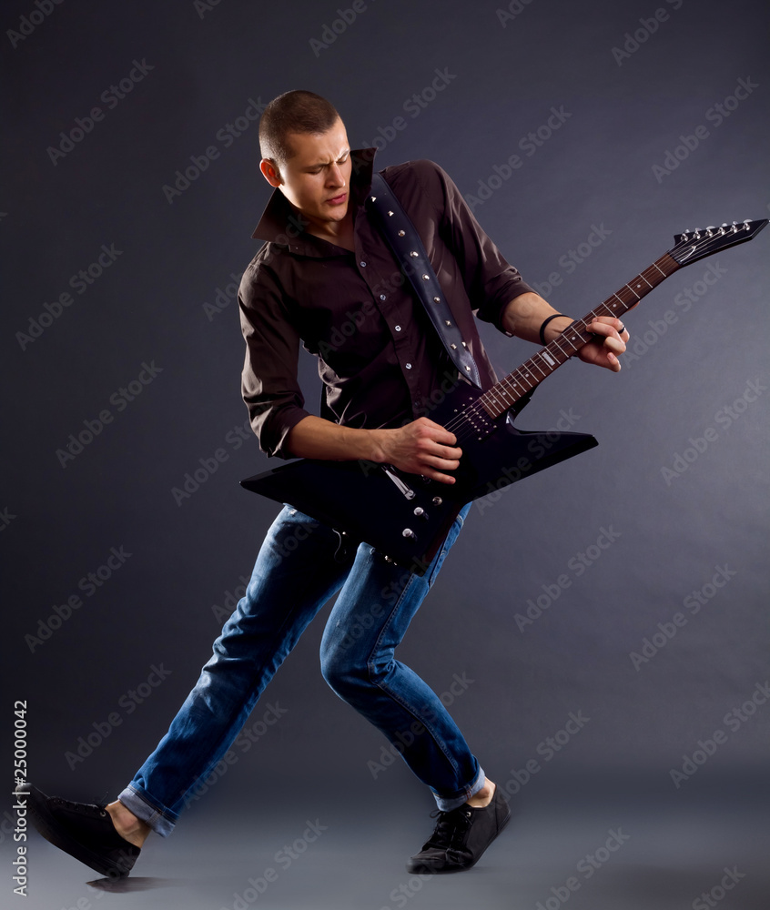 Fototapeta premium awesomen guitar player