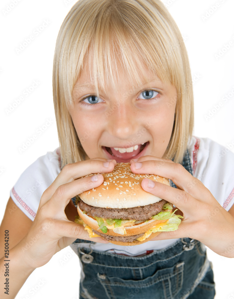 Happy Little Girl Eating Hamburger.