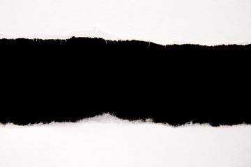 Hole ripped in paper