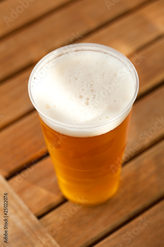 beer standing on a wooden table