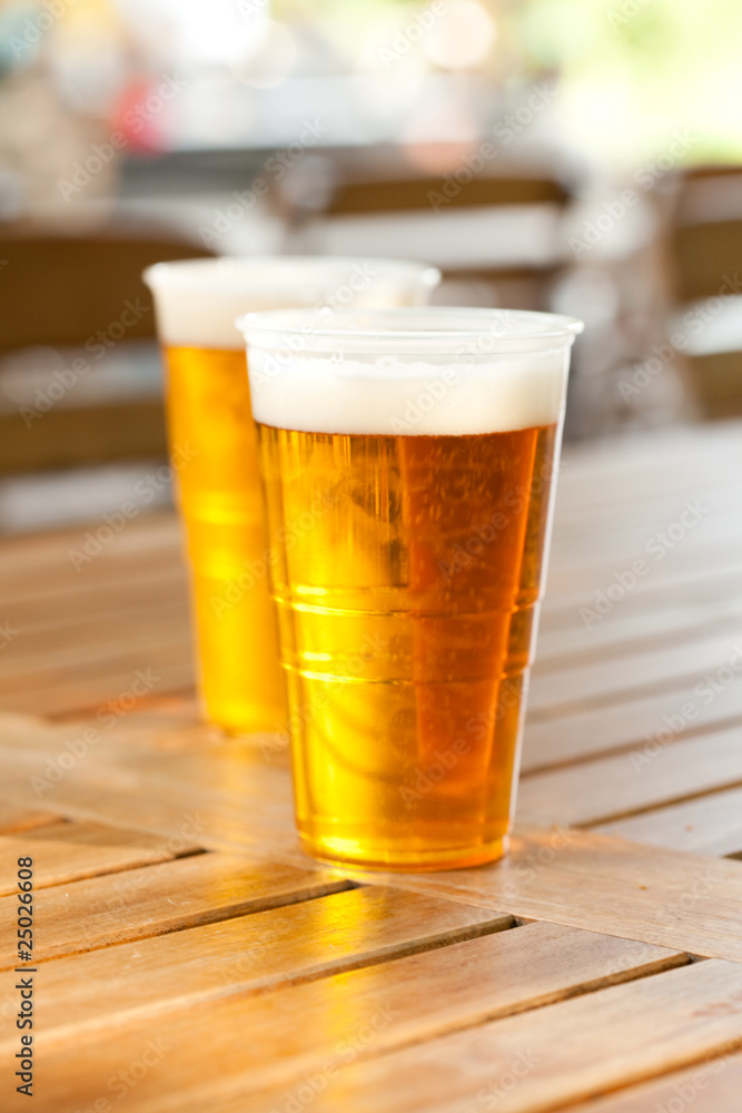 beer standing on a wooden table beer standing on a wooden table