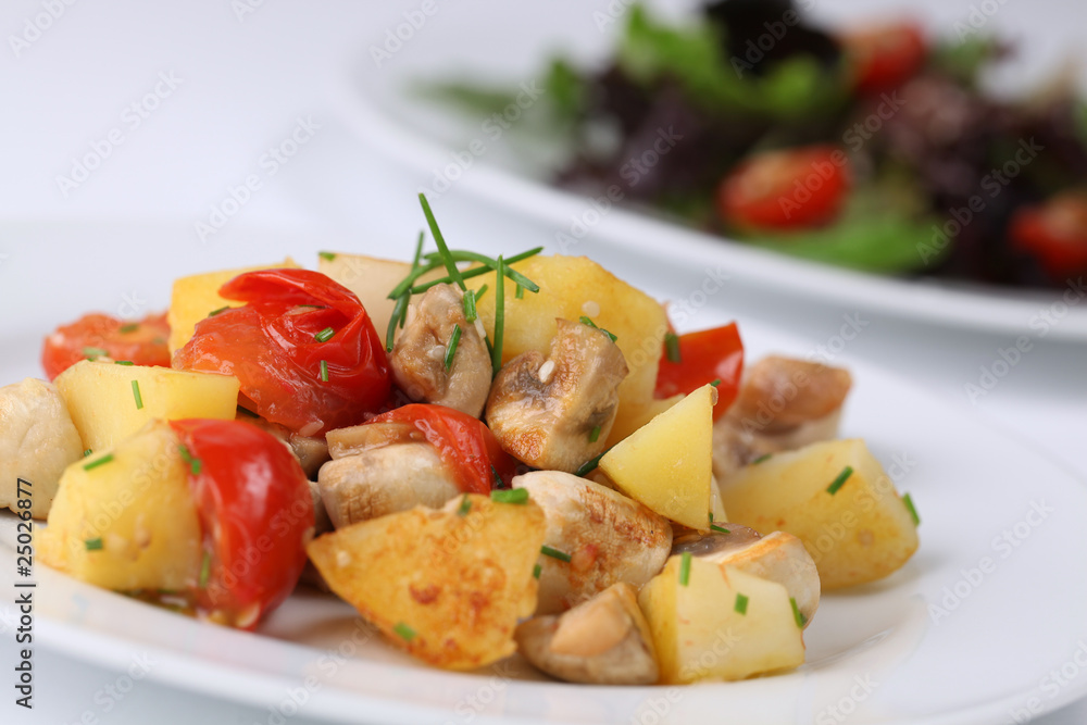 Fried potatoes with mushrooms and cherry tomatoes Fried potatoes with mushrooms and cherry tomatoes