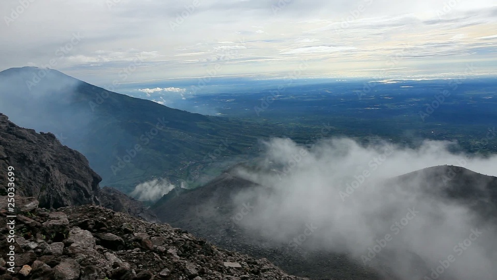 Merbabu mountain from the slope of the Merapi volcano Merbabu mountain from the slope of the Merapi volcano
