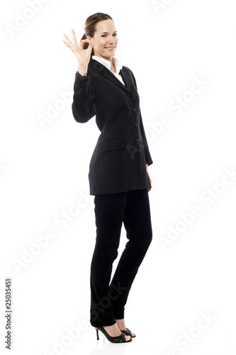 young businesswoman with her hand indicating ok