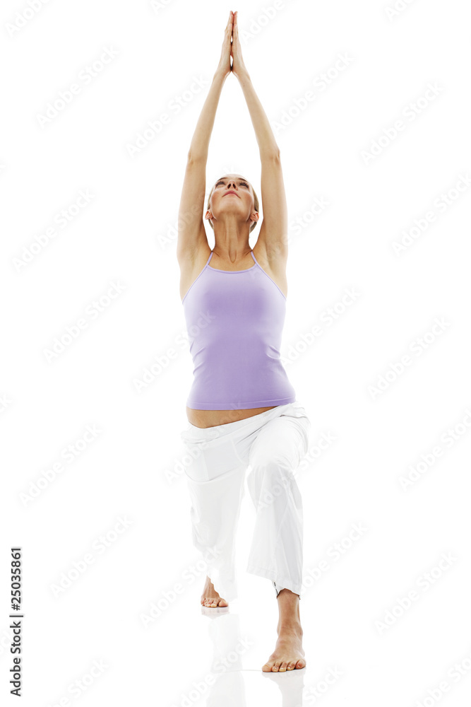 Young woman practicing yoga on white background studio
