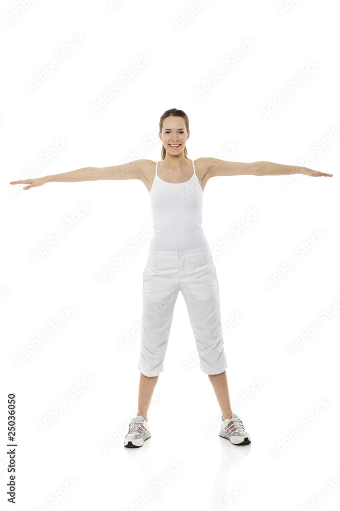 Young woman doing gymnastics on white background studio