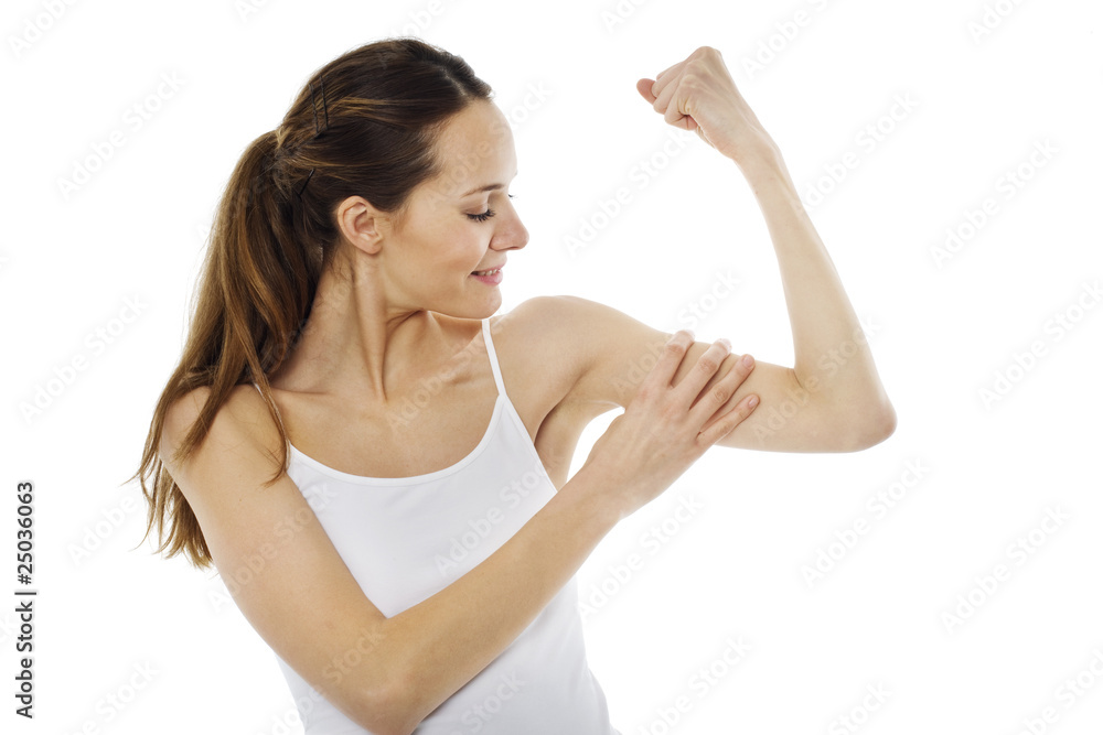 Young woman doing gymnastics on white background studio Young woman doing gymnastics on white background studio