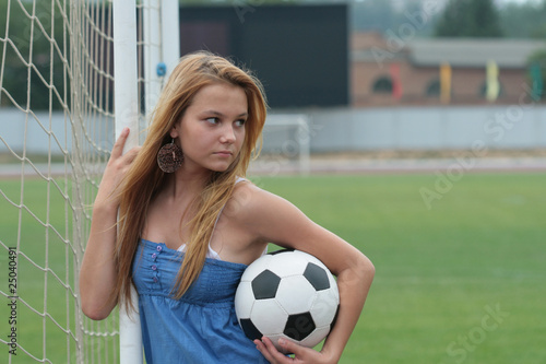 The girl with a football © YURY MARYUNIN