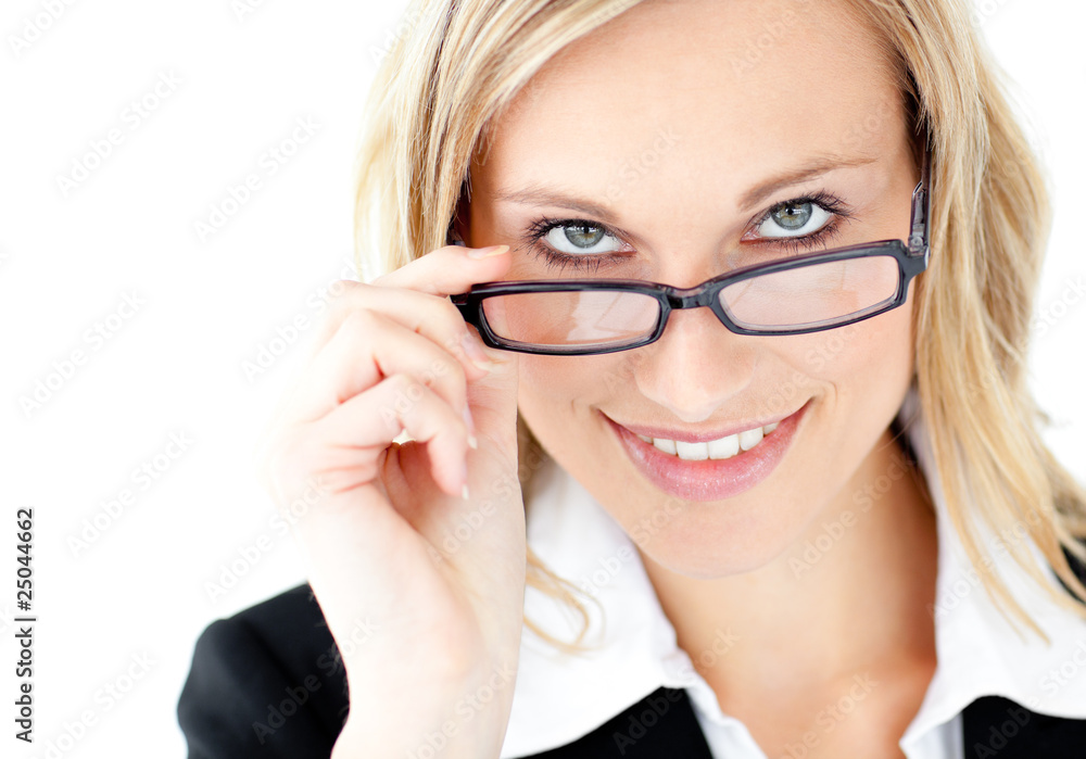 Charismatic young businesswoman smiling at the camera Charismatic young businesswoman smiling at the camera